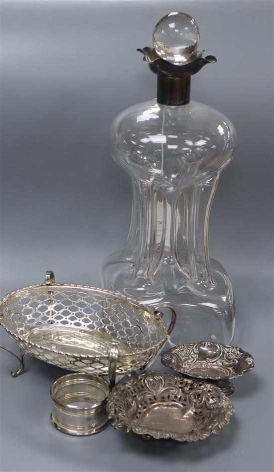 An Edwardian silver mounted waisted decanter, London, 1901, two small silver bonbon dishes, a pierced silver dish etc.